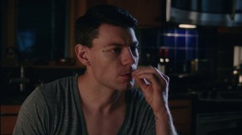 Movie still from “Queen of Earth” (2015), directed by Alex Ross Perry – A person sitting in front of a window; Close Up shot, Low angle