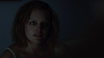 Movie still from “Queen of Earth” (2015), directed by Alex Ross Perry – A person looking at the camera; Close Up shot, Low angle