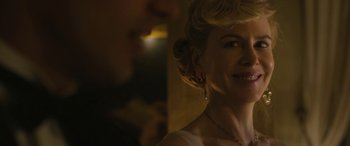 Movie still from “Queen of the Desert” (2015), directed by Werner Herzog – A person wearing a dress; Close Up shot, Over the shoulder angle