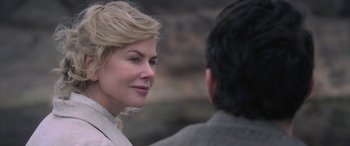 Movie still from “Queen of the Desert” (2015), directed by Werner Herzog – A beautiful blonde woman talking to a man; Close Up shot, Over the shoulder angle