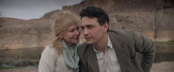 Movie still from “Queen of the Desert” (2015), directed by Werner Herzog – A man and a woman sitting next to each other; Close Up shot, Over the shoulder angle