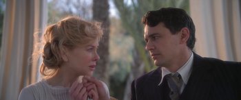 Movie still from “Queen of the Desert” (2015), directed by Werner Herzog – A man and a woman looking at one another; Close Up shot, Over the shoulder angle