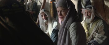 Movie still from “Queen of the Desert” (2015), directed by Werner Herzog – A man and a woman dressed in biblical clothing; Medium shot, Over the shoulder angle