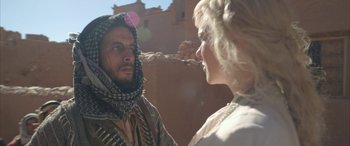 Movie still from “Queen of the Desert” (2015), directed by Werner Herzog – A man and a woman are standing in front of each other; Close Up shot, Over the shoulder angle