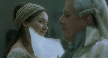 Movie still from “Quills” (2000), directed by Philip Kaufman – An older man and a young woman looking at each other; Close Up shot, Over the shoulder angle