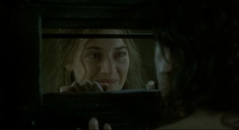 Movie still from “Quills” (2000), directed by Philip Kaufman – A woman looking at her reflection in a mirror; Close Up shot, Over the shoulder angle
