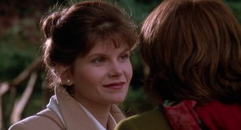 Movie still from “Raising Cain” (1992), directed by Brian De Palma – A person wearing a jacket; Close Up shot, Over the shoulder angle