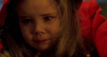 Movie still from “Raising Cain” (1992), directed by Brian De Palma – A young girl's face; Close Up shot, High angle
