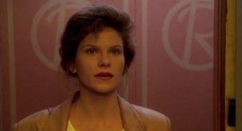 Movie still from “Raising Cain” (1992), directed by Brian De Palma – A person wearing a leather jacket; Close Up shot, Low angle