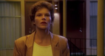 Movie still from “Raising Cain” (1992), directed by Brian De Palma – A person wearing a jacket; Close Up shot, Low angle