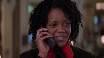 Movie still from “Rat Race” (2001), directed by Jerry Zucker – A person talking on a cell phone; Close Up shot, Low angle