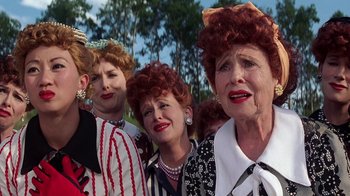 Movie still from “Rat Race” (2001), directed by Jerry Zucker – A group of women with red and white hair; Close Up shot, Over the shoulder angle