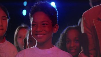 Movie still from “Rat Race” (2001), directed by Jerry Zucker – A group of young people standing next to each other; Close Up shot, Low angle