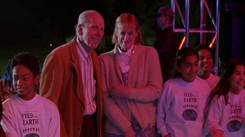 A man and a woman standing next to each other