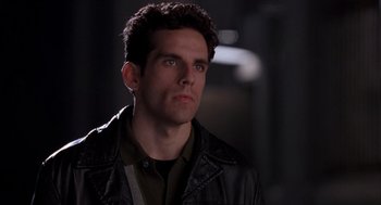 Movie still from “Reality Bites” (1994), directed by Ben Stiller – A person wearing a leather jacket; Close Up shot, Low angle