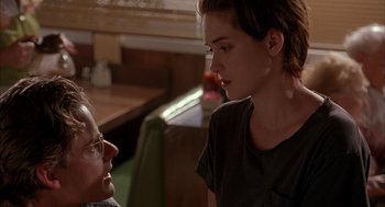 Movie still from “Reality Bites” (1994), directed by Ben Stiller – A man and a woman talking to each other; Close Up shot, Over the shoulder angle