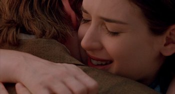 Movie still from “Reality Bites” (1994), directed by Ben Stiller – A person laying on a blanket; Close Up shot, Over the shoulder angle