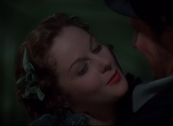 Movie still from “Reap the Wild Wind” (1942), directed by Cecil B. DeMille – A woman's face and a man's face; Close Up shot, Over the shoulder angle