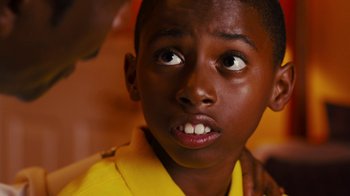 Movie still from “Red Hook Summer” (2012), directed by Spike Lee – A young boy's eyes and face; Close Up shot, Over the shoulder angle