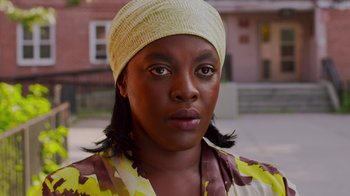 Movie still from “Red Hook Summer” (2012), directed by Spike Lee – A person wearing a head band; Close Up shot, High angle