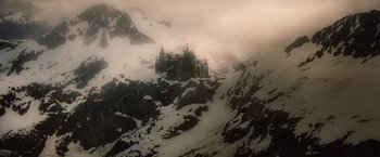 Movie still from “Red Riding Hood” (2011), directed by Catherine Hardwicke – A castle on top of a snowy mountain; Extreme Wide shot, High angle