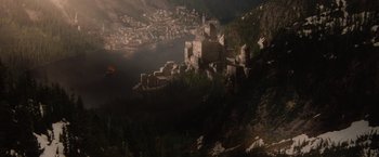 Movie still from “Red Riding Hood” (2011), directed by Catherine Hardwicke – An aerial view of a castle on top of a hill; Extreme Wide shot, High angle