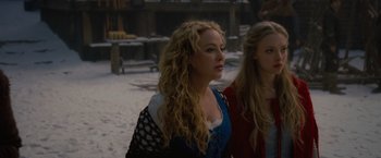 Movie still from “Red Riding Hood” (2011), directed by Catherine Hardwicke – Two women in medieval garb standing next to each other; Close Up shot, Over the shoulder angle