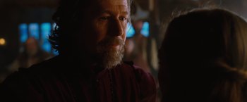 Movie still from “Red Riding Hood” (2011), directed by Catherine Hardwicke – A man with a long beard is looking at the camera; Close Up shot, Over the shoulder angle