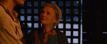 Movie still from “Red Riding Hood” (2011), directed by Catherine Hardwicke – A woman with a head scarf looking up at the sky; Close Up shot, Low angle