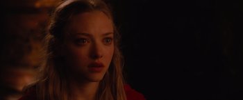 Movie still from “Red Riding Hood” (2011), directed by Catherine Hardwicke – A person with long blonde hair; Close Up shot, Over the shoulder angle