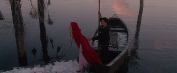 Movie still from “Red Riding Hood” (2011), directed by Catherine Hardwicke – A man and a woman are in a row boat; Wide shot, High angle