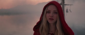 Movie still from “Red Riding Hood” (2011), directed by Catherine Hardwicke – A person wearing a hooded jacket; Close Up shot, Over the shoulder angle