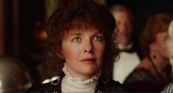 Movie still from “Reds” (1981), directed by Warren Beatty – A person wearing a dress; Close Up shot, Over the shoulder angle