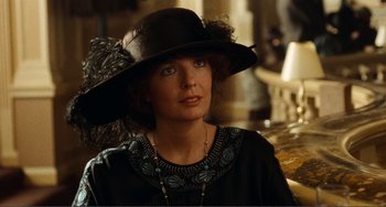 Movie still from “Reds” (1981), directed by Warren Beatty – A person wearing a hat; Close Up shot, Over the shoulder angle