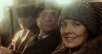 Movie still from “Reds” (1981), directed by Warren Beatty – A person wearing a hat; Close Up shot, Over the shoulder angle