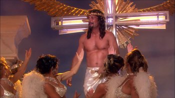 Movie still from “Reefer Madness: The Movie Musical” (2005), directed by Andy Fickman – A man with a crown of thorns on his head; Wide shot, High angle