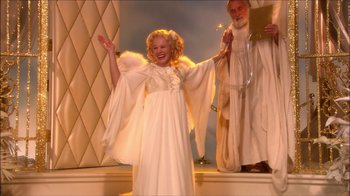 Movie still from “Reefer Madness: The Movie Musical” (2005), directed by Andy Fickman – A girl dressed as an angel and an old man dressed as an angel; Wide shot, High angle