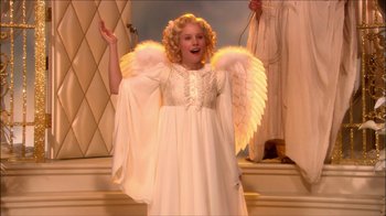 Movie still from “Reefer Madness: The Movie Musical” (2005), directed by Andy Fickman – A girl dressed as an angel for a christmas play; Medium shot, High angle