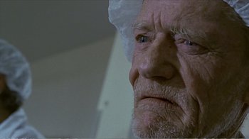 Movie still from “Reindeer Games” (2000), directed by John Frankenheimer – An old man with a white hat looking at the camera; Close Up shot, Low angle