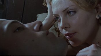 Movie still from “Reindeer Games” (2000), directed by John Frankenheimer – A person laying on a bed; Close Up shot, Low angle