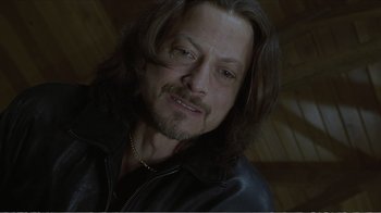 Movie still from “Reindeer Games” (2000), directed by John Frankenheimer – A person with long hair; Close Up shot, Low angle