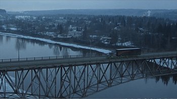 Movie still from “Reindeer Games” (2000), directed by John Frankenheimer – A view of a bridge over a body of water; Extreme Wide shot, High angle