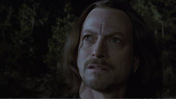 Movie still from “Reindeer Games” (2000), directed by John Frankenheimer – A person with long hair; Close Up shot, Low angle