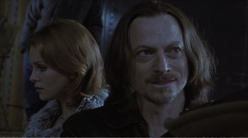 Movie still from “Reindeer Games” (2000), directed by John Frankenheimer – A person with long hair; Close Up shot, Over the shoulder angle