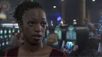 Movie still from “Reindeer Games” (2000), directed by John Frankenheimer – A person in a room; Close Up shot, Over the shoulder angle