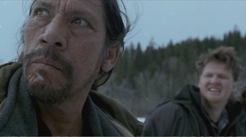 Movie still from “Reindeer Games” (2000), directed by John Frankenheimer – A person looking up at the sky; Close Up shot, Over the shoulder angle