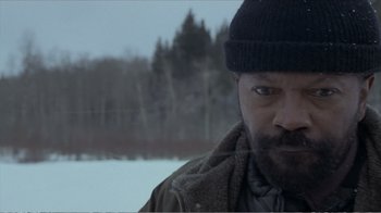 Movie still from “Reindeer Games” (2000), directed by John Frankenheimer – A person wearing a jacket and a hat; Close Up shot, Low angle