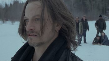 Movie still from “Reindeer Games” (2000), directed by John Frankenheimer – A person with long hair; Close Up shot, Over the shoulder angle