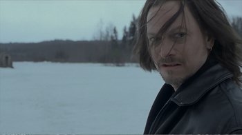 Movie still from “Reindeer Games” (2000), directed by John Frankenheimer – A person with long hair; Close Up shot, Over the shoulder angle