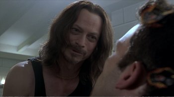 Movie still from “Reindeer Games” (2000), directed by John Frankenheimer – A person with long hair; Close Up shot, Over the shoulder angle